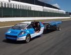 Solartaxi and Louis Palmer on Taupo Racetrack in New Zealand